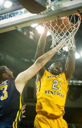 NKU's Jalen Billups dunks the ball during NKU's loss to Toledo 57-55. NKU lost to University of Toledo 57-55 on Saturday, Jan. 3, 2015 at The Bank of Kentucky Center.