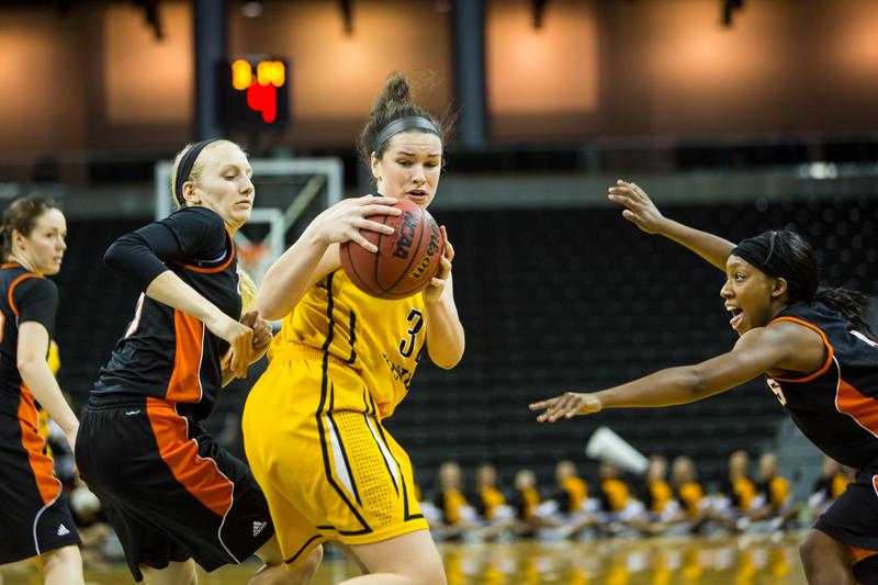 NKUs Melody Doss drives the lane to the basket during NKUs victory over Georgetown College. NKU defeated Georgetown College 78-57 on Tuesday, Jan. 6, 2015 at The Bank of Kentucky Center. 