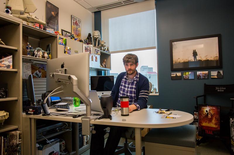 John Gibson sits in his office on the fifth floor of Griffin Hall. Gibsons office is unique because of his toy collection.