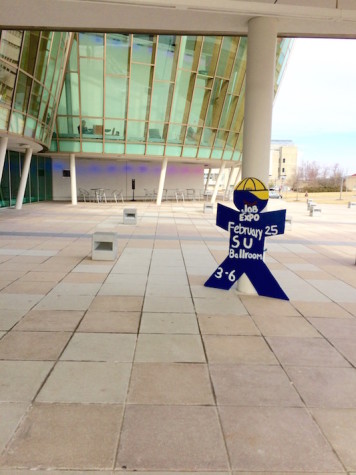 A blue Job Expo man sits outside of Griffin Hall. The Job Expo will take place Feb. 25, 2015.