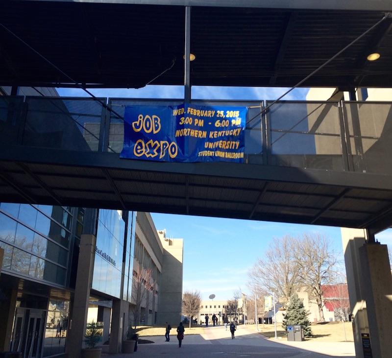 A+Job+Expo+banner+hangs+from+the+breezeway+between+the+Student+Union+and+the+University+Center.+The+Job+Expo+will+take+place+Feb.+25%2C+2015.