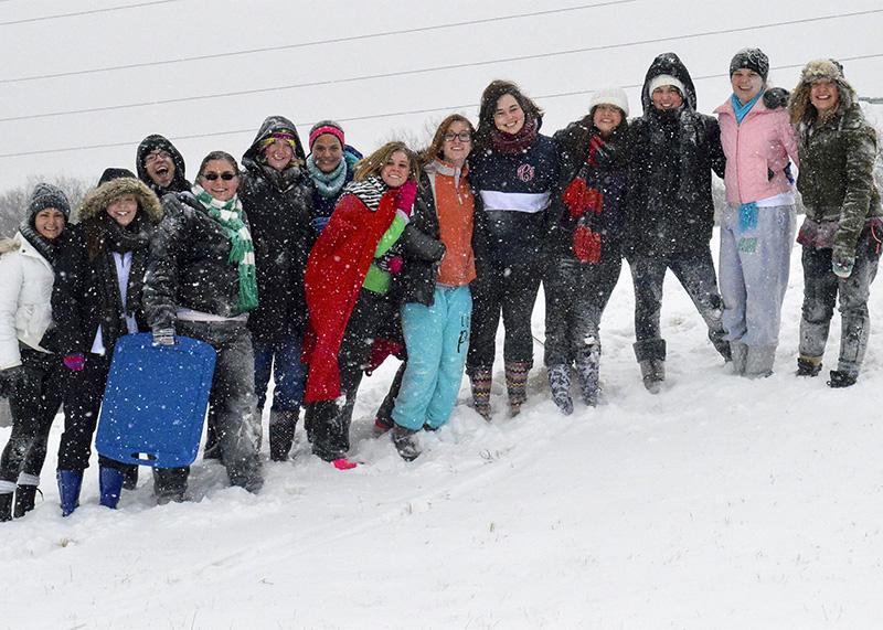 A group of students gathered on campus for Snow Day fun. NKU was closed Monday, Feb. 16 due to inclement weather.