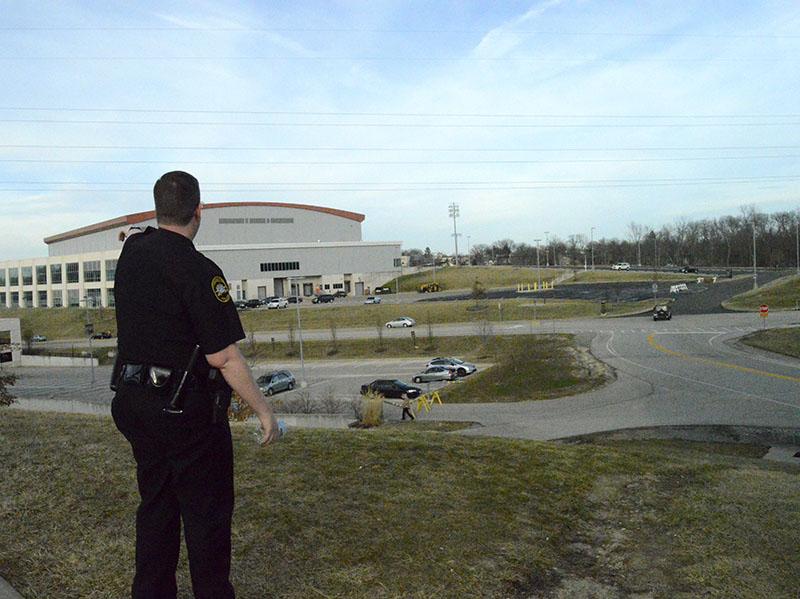 Lieutenant John Gaffin addresses the need for additional lighting along University Drive near the Bank of Kentucky Center. The Norse Walk took place Monday, March 16. ​