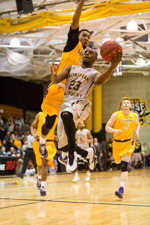 NKU guard Todd Johnson (23) goes up to shoot the layup during NKU's first A-Sun conference tournament game hosted at Regents Hall. NKU lost to Lipscomb in NKU's first A-Sun conference tournament 76-73 in Regents Hall on Tuesday, Mar. 3, 2015.