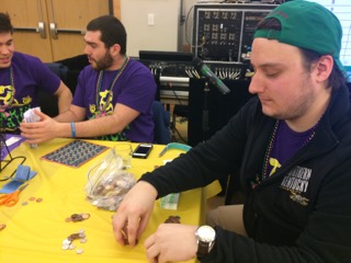 Chris Benvie helps ready a game of bingo. 