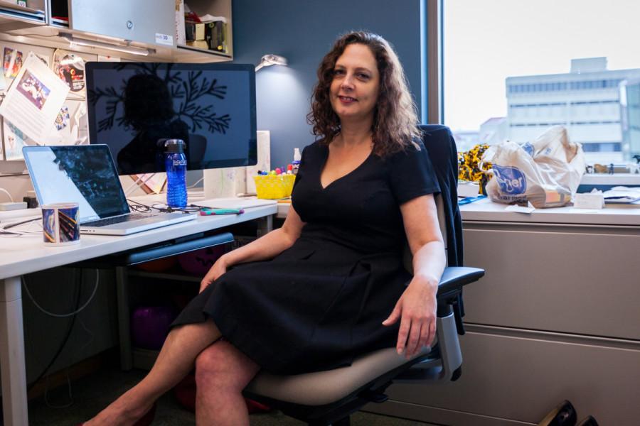 Renee Human sits at her desk in her office on the fourth floor of Griffin Hall. Human is the last office in NKUs Top Offices.