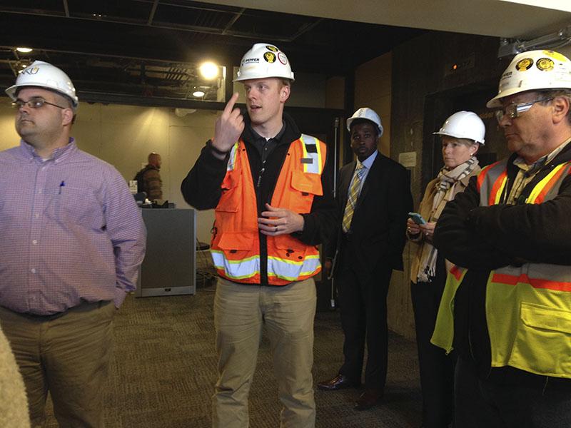 From left to right, Project Manager Brad Lehman, Project Manager JD Barnes and Group Superintendent Joe Deacon discuss some of the new Rec Center features the senators may see on the tour. SGA toured the site March 30.