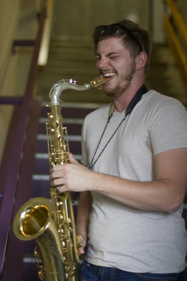 Jazz Studies major AJ Pearson practicing on his Tenor Saxophone in the stairwell