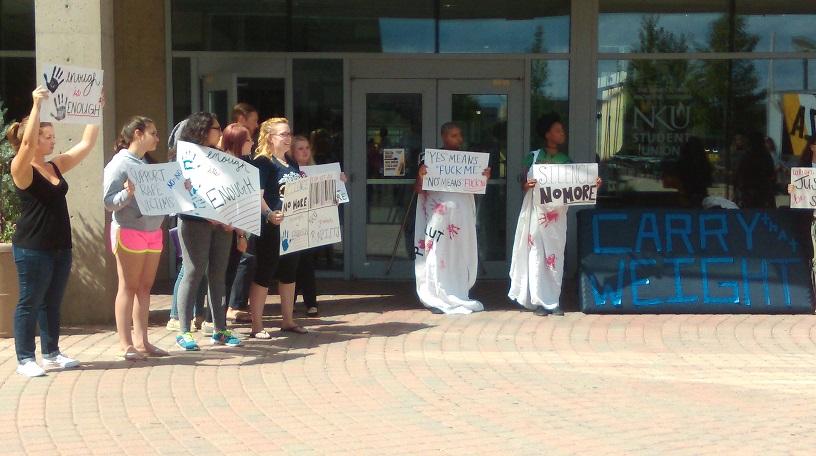 The Carry the Weight protest, which was organized by an individual group of students, took place on Sept. 10 on NKUs plaza. Protesters stood with signs to protest against rape and domestic abuse. 