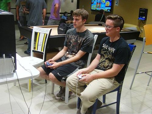 Students play in the Smash Bros Tournament. This is the first tournament of the semester in the game room.