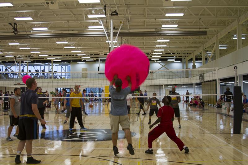 Students returning the ball to the other team