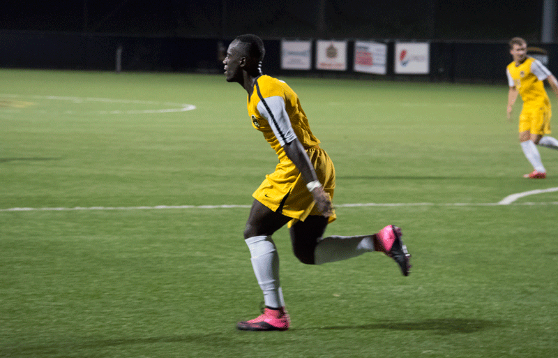 Yaw Addai celebrates the game-tying goal scored in the 88th minute Wednesday night at NKU Soccer Stadium. Addais goal would help NKu earn a 2-2 draw against the Jaguars.