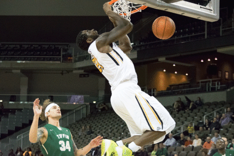 GALLERY: Second half surge gives Norse men first win, 83-71