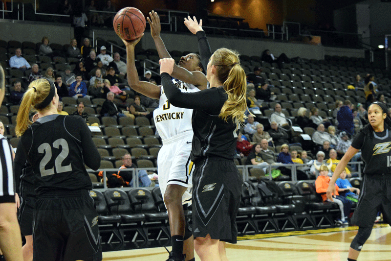 Rebecca Lyttle (3) puts a shot up over a defender during Saturday's game against Akron.