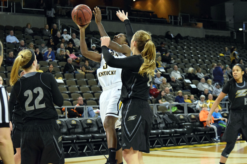 Rebecca Lyttle (3) puts a shot up over a defender during Saturdays game against Akron.