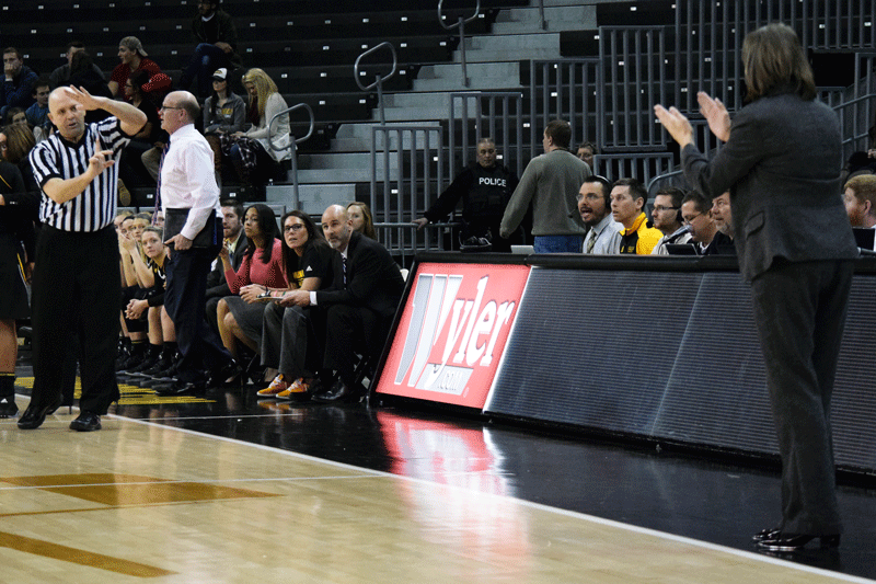 NKU Head Coach Dawn Plitzuweit (right) is assessed a technical foul during Saturdays game against Milwaukee.