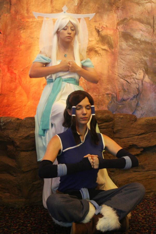 Kerner stands as Raava and Koehler is Korra from 'Legend of Korra'. These are the kind of costumes seen at conventions.