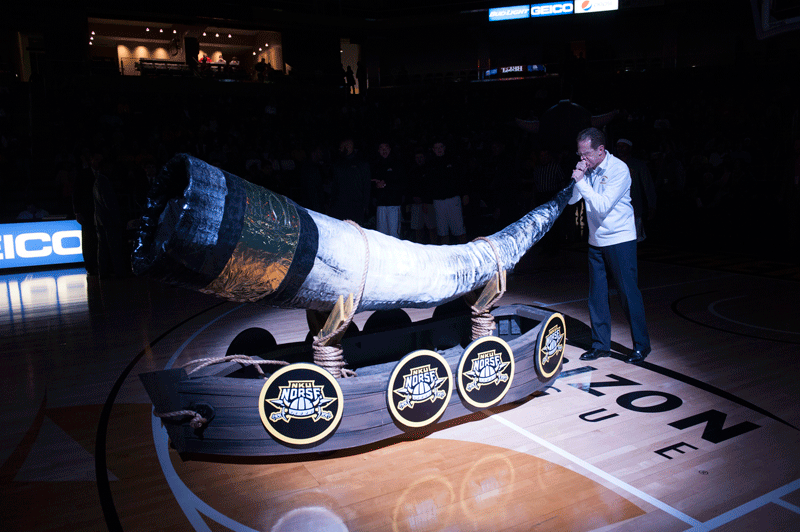 NKU President Geoffrey Mearns summons the Norse before a basketball game this season.