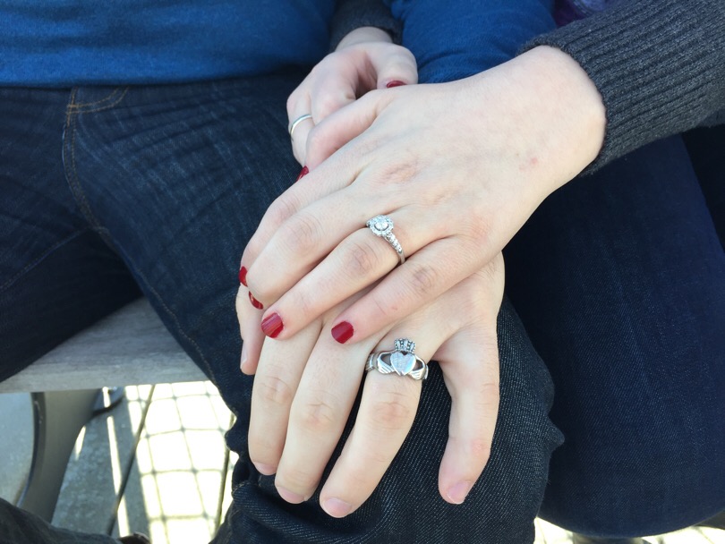 Danny Hagedorn's claddagh ring represents love, loyalty and friendship. Nicole Hudson wears her engagement ring.