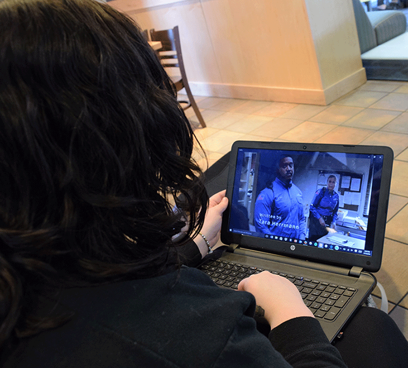 Erica Bowen watches her favorite show on Netflix. She often takes breaks from studying to enjoy online shows. 