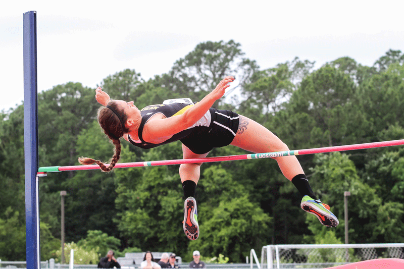 Sophomore Jordan Horning competes in the high jump event, one of seven events of the heptathlon. 