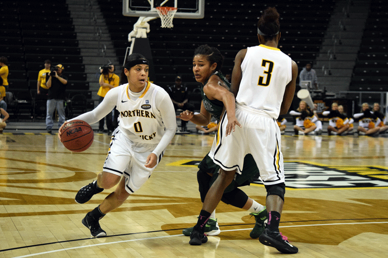 SharRae Davis (0) uses a screen set by Rebecca Lyttle (3) to drive around a defender Thursday night against USC Upstate.