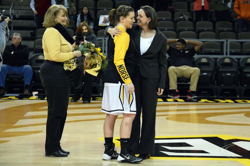 NKU senior Rianna Gayheart is greated by Coach Dawn Plitzuweit during senior night festivities at BB&T Arena. Plitzuweit was hired by South Dakota Friday.