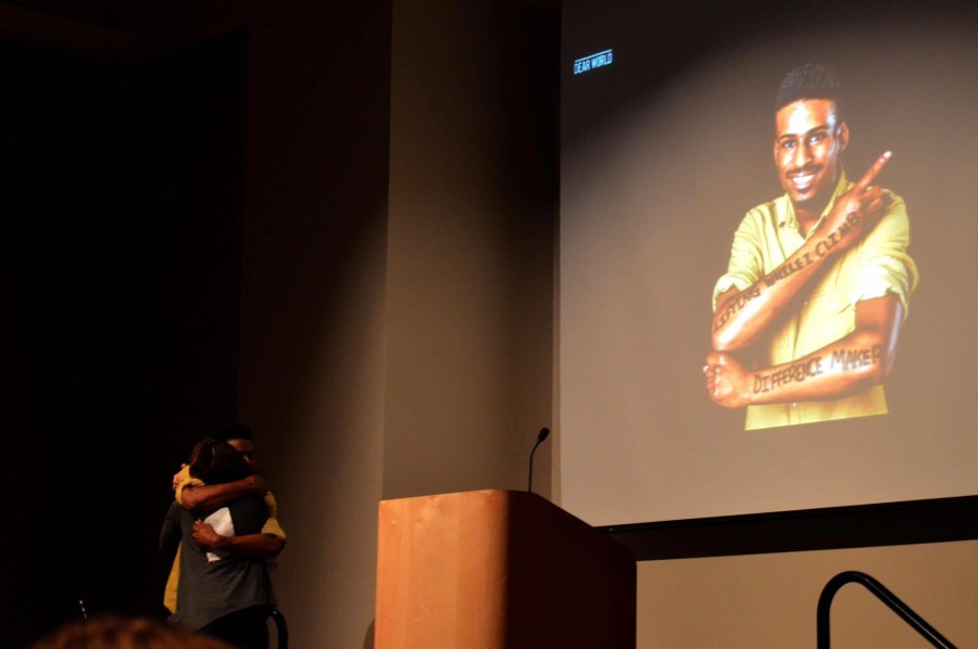 Kristian Johnson embraces Katie Greenman. Greenman was the lead speaker at the event and hugged each speaker afterwards. 