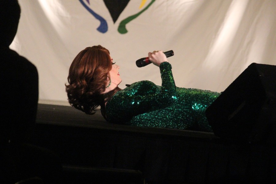 Mirelle Jane Divine lays on stage and waits for Crystyle Starr’s next performance.