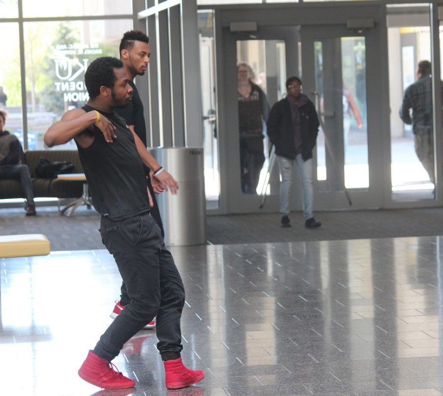 ENVI dance team floods on to the Student Union second floor performing several dance routines. Freshman dancers, Marquise Howie and Daante Bowman and reenact a dance battle between the other dance members. 