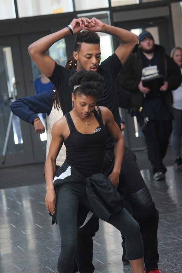 Popping, two stepping and backing it up, Rhonisha Gentry and Daante Bowman, members of ENVI dance team, show the Student Union lobby what ENVI has to offer. “We are trying to make ENVI something people all over campus know and want to see!” Daante Bowman said.