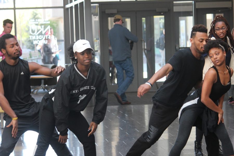 ENVI dancers flood into the Student Union hallway with a flash mob performance