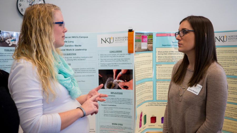Abagaile Long, a student in the Master's program for social work, showcases her findings at Celebration on April 12. Long researched prevalence of drugs on campus. 