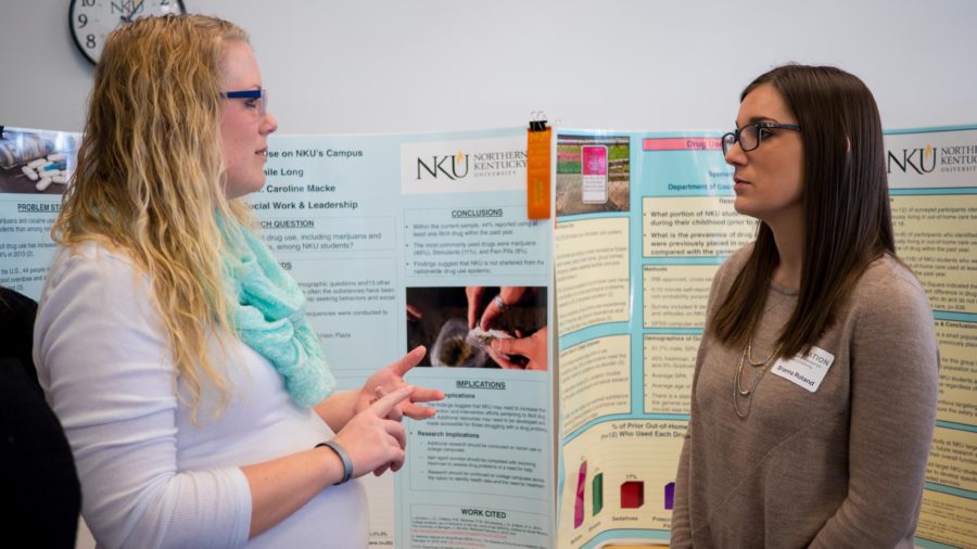 Abagaile Long, a student in the Master's program for social work, showcases her findings at Celebration on April 12. Long researched prevalence of drugs on campus.
