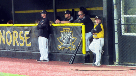 Ryan Mavriplis, NKU baseball's team manager, looks on from the dugout.