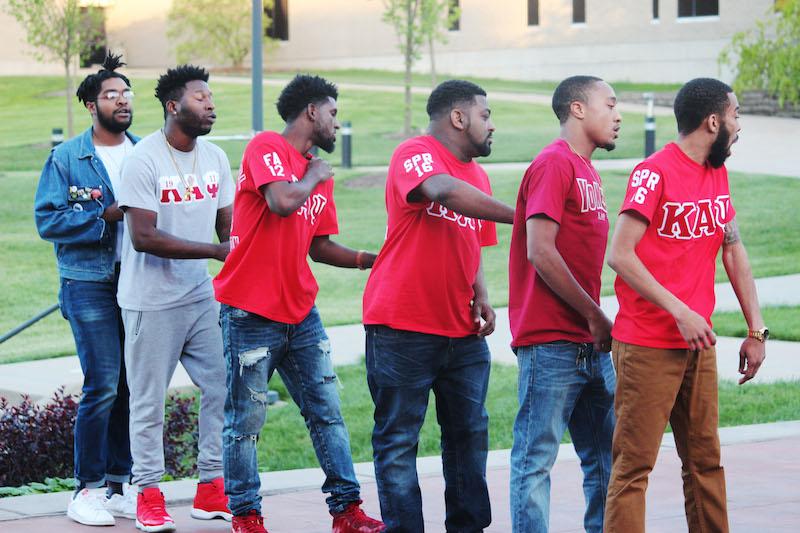 Kappa Alpha Psi Fraternity steps in formation to various popular songs for the crowd.