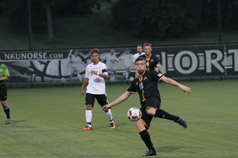 Defender Calvin Murphy prepares to pass against EIU. The two teams tied 1-1 in double overtime 