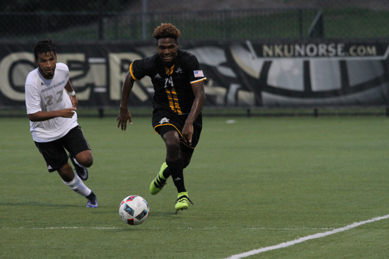 Midfielder Eirik Abney tries to chase down a lose ball against EIU.