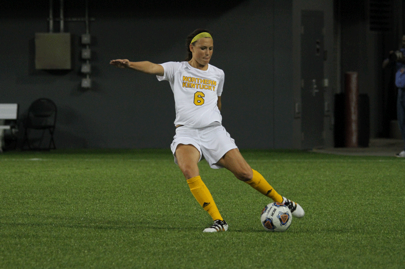 Forward Ally Perkins prepares to the kick the ball in the game against UC.