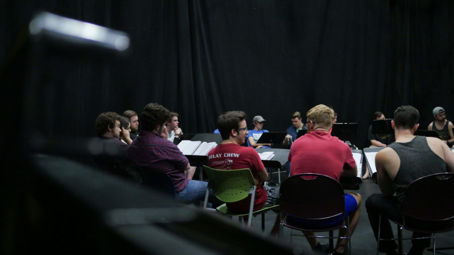 Cast of The Grapes of Wrath reads over their lines during rehearsal. 