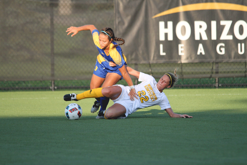 Rachel Conaway slides to get the ball away from an MSU defender. NKU won the game 1-0