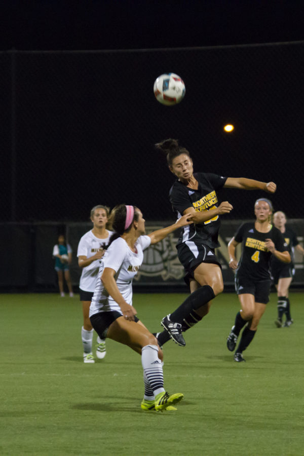 Katelyn Newton heads a ball up the field against Milwaukee. Newton and the Norse fell to the Panthers 1-0