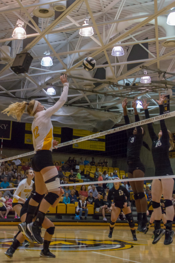 Laura Crawford tries to tap a ball past the Cleveland State blockers. The Norse would lose their third straight Horizon League match to CSU 3-2.