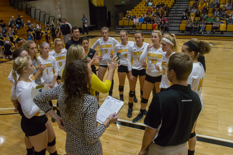 The Norse discuss strategy during a timeout against Cleveland State.