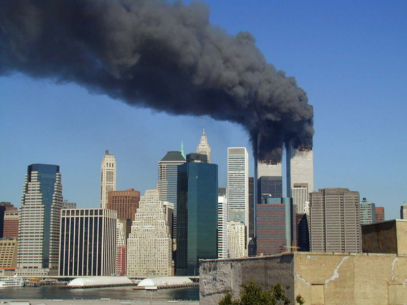 Plumes of smoke billow from the World Trade Center towers in Lower Manhattan, New York City on Sept. 11, 2001.