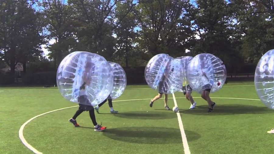 Players are surrounded by a giant bubble and encouraged to bounce into each other as they fight for possession of the ball.