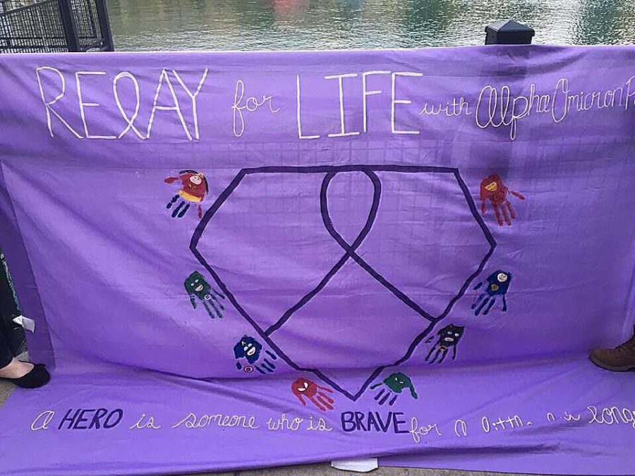 Otten's sorority, Alpha Omicron Pi, made this banner for 2016 Relay for Life.