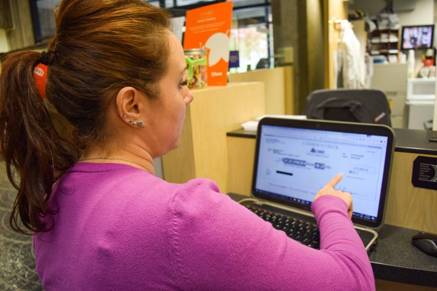 Danielle Moore, the assistant manager of the NKU branch of US Bank hopes students will heed the bank's warnings about check fraud.