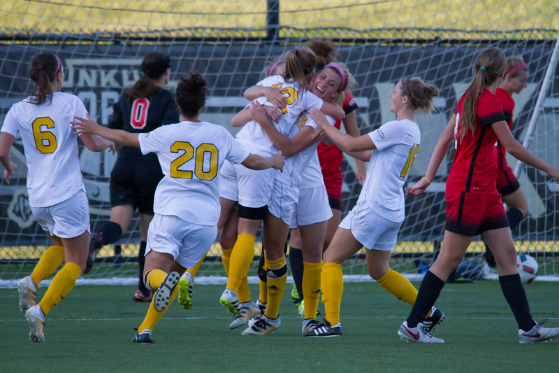 Macy Hamblin embraces Jessica Frey after Frey scored the game winning goal in the 80th minute.