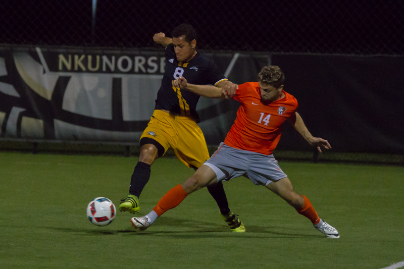 Alwin Komolong dodges a Bowling Green defender. The Norse lost to BGSU 2-1